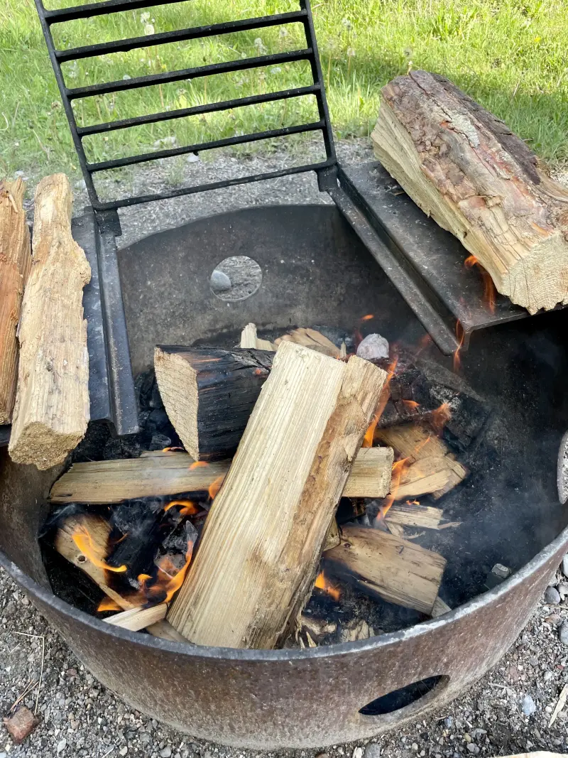 Starting the fire, still some wet wood but it worked